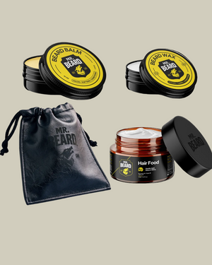 Collection of Mr. Beard grooming products including balm, wax, and hair food with a black drawstring bag on a white background.