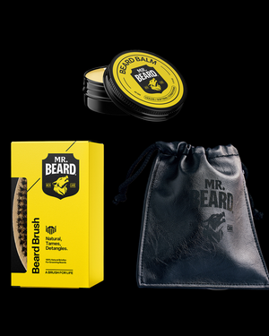 The image displays a beard control bundle which includes a yellow box of beard balm, a black beard brush with yellow details, and a black leather travel pouch with the Mr. Beard logo.