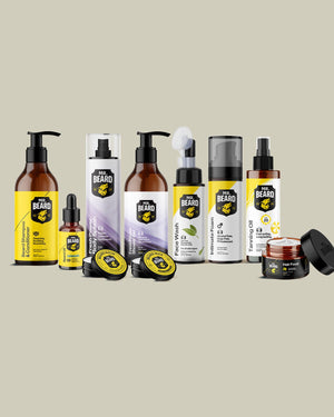 A collection of beard grooming products from Mr. Beard, including beard wash, beard oil, beard balm, and beard care bottles, arranged on a solid light beige background.