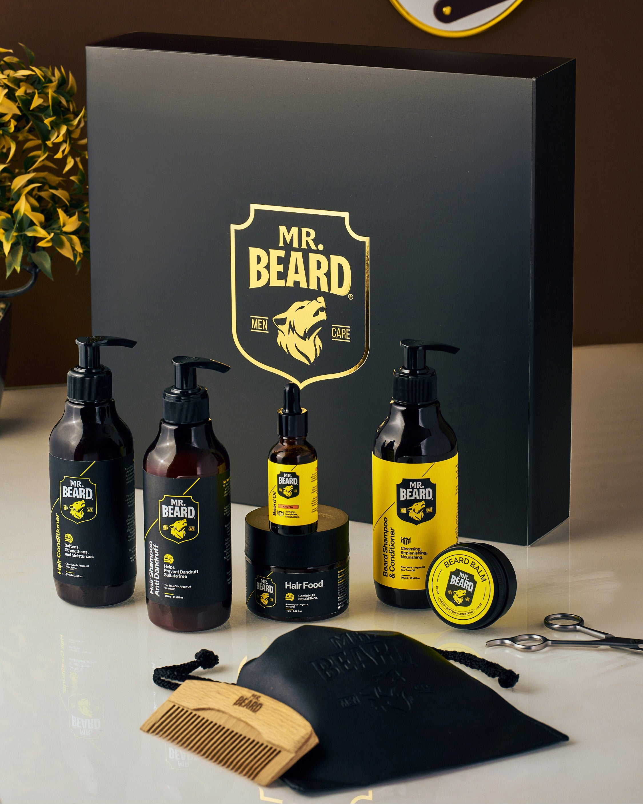 Mr. Beard grooming products set with packaging on a reflective surface.